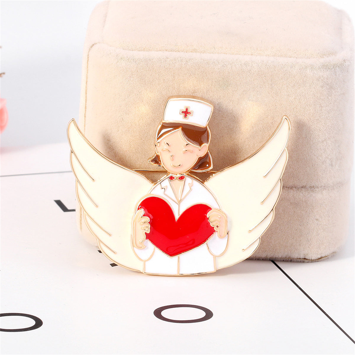 Red Enamel and 18K Gold-Plated Nurse Wing Heart Brooch, gold brooch pin, vintage-inspired design, detail close-up