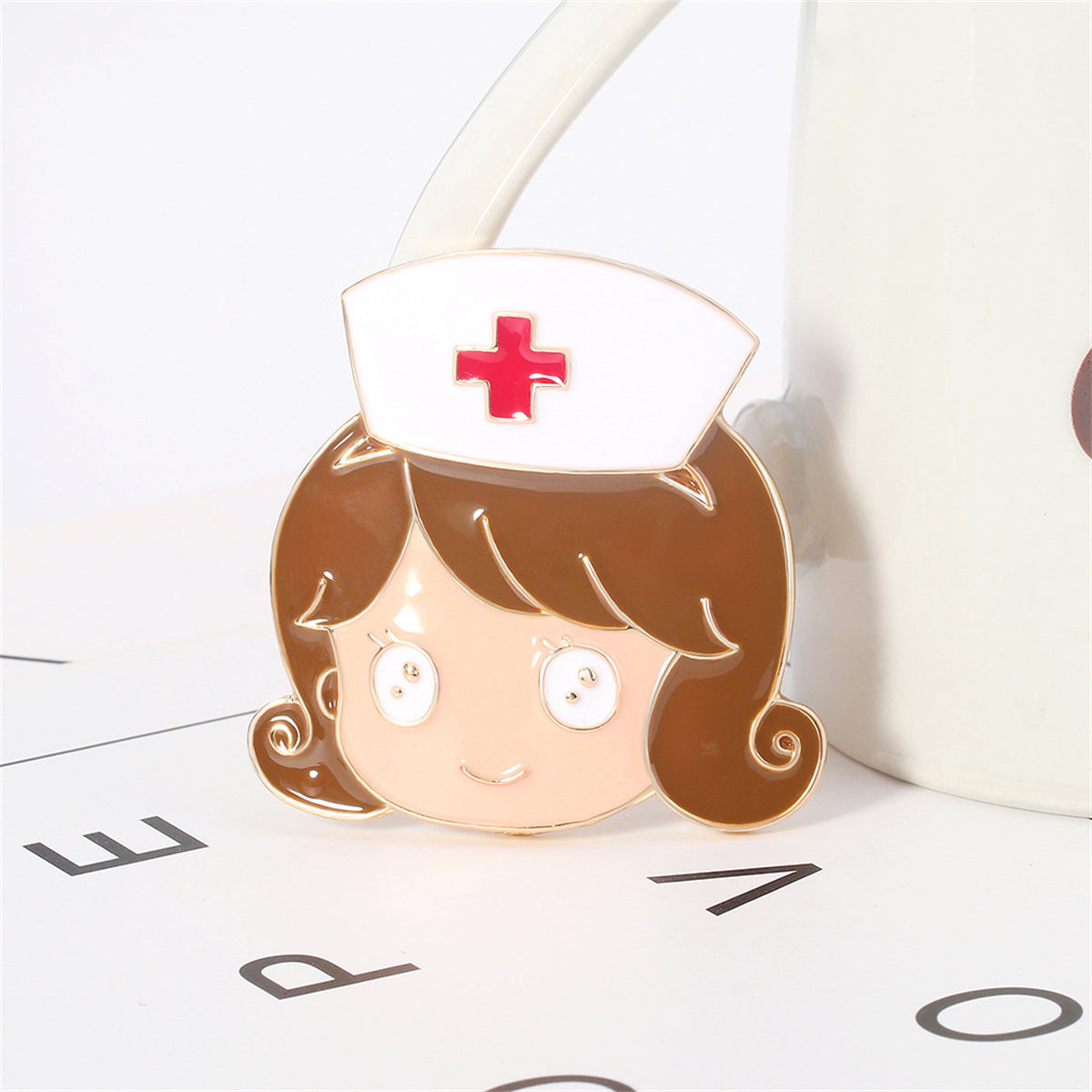 Enamel and 18K Gold-Plated Nurse Brooch, gold brooch pin, botanical inspired, side view