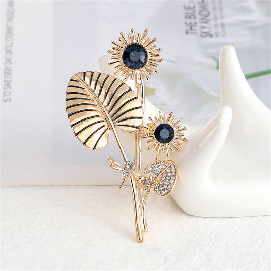 Black Crystal and Cubic Zirconia 18K Gold-Plated Dragonfly Sunflower Brooch, gold brooch pin, botanical inspired, front view