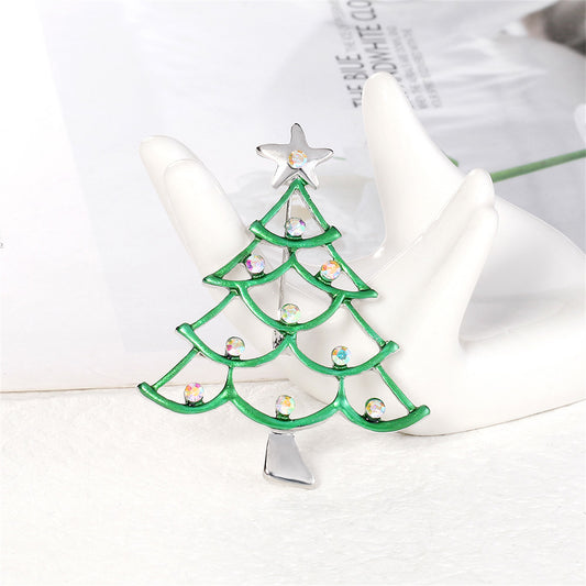 Clear Iridescent Cubic Zirconia and Green Enamel Star Christmas Tree Brooch, brooch pin, dainty minimalist design, front view