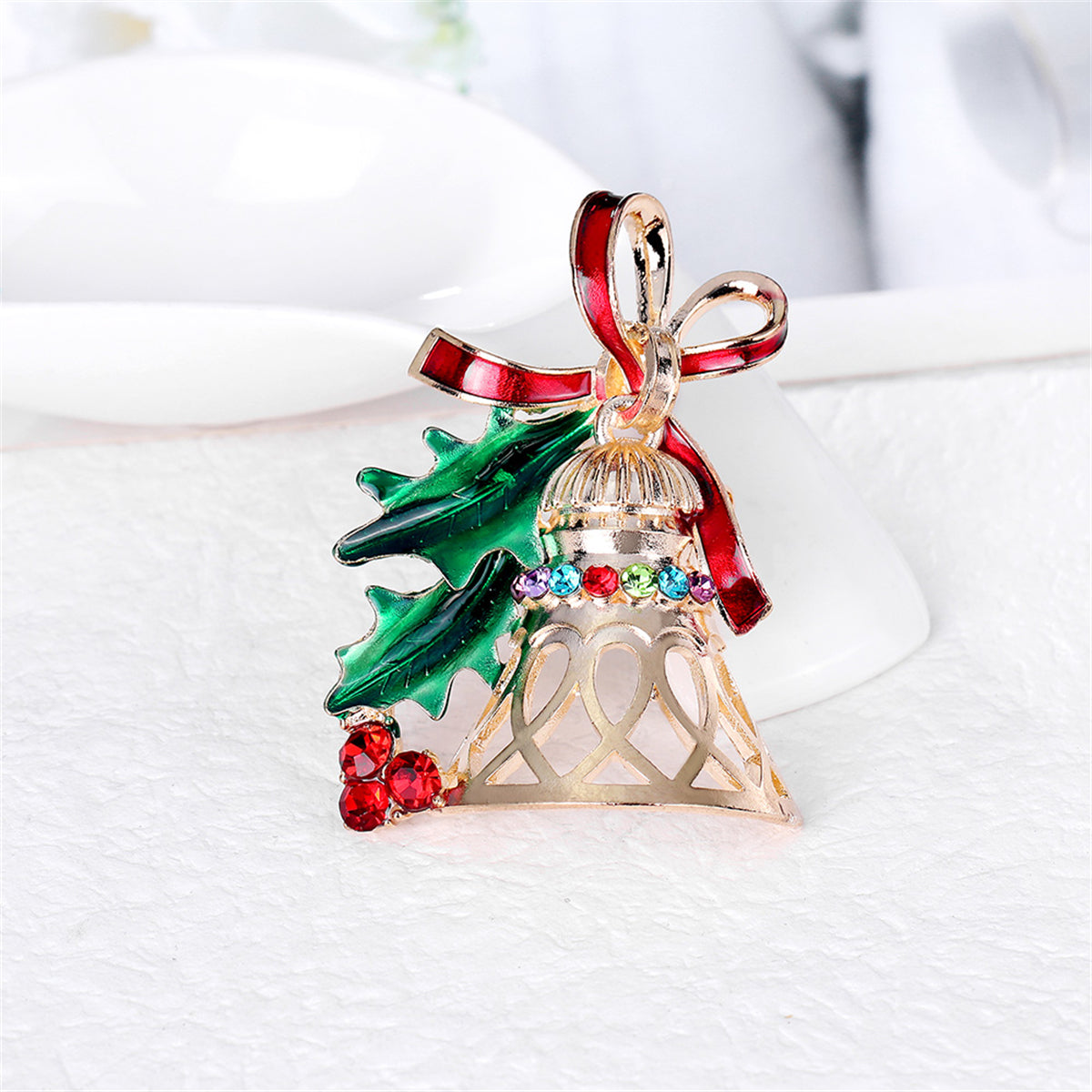 Red Cubic Zirconia and Green Enamel Bell Brooch, brooch pin, dainty minimalist design, detail close-up