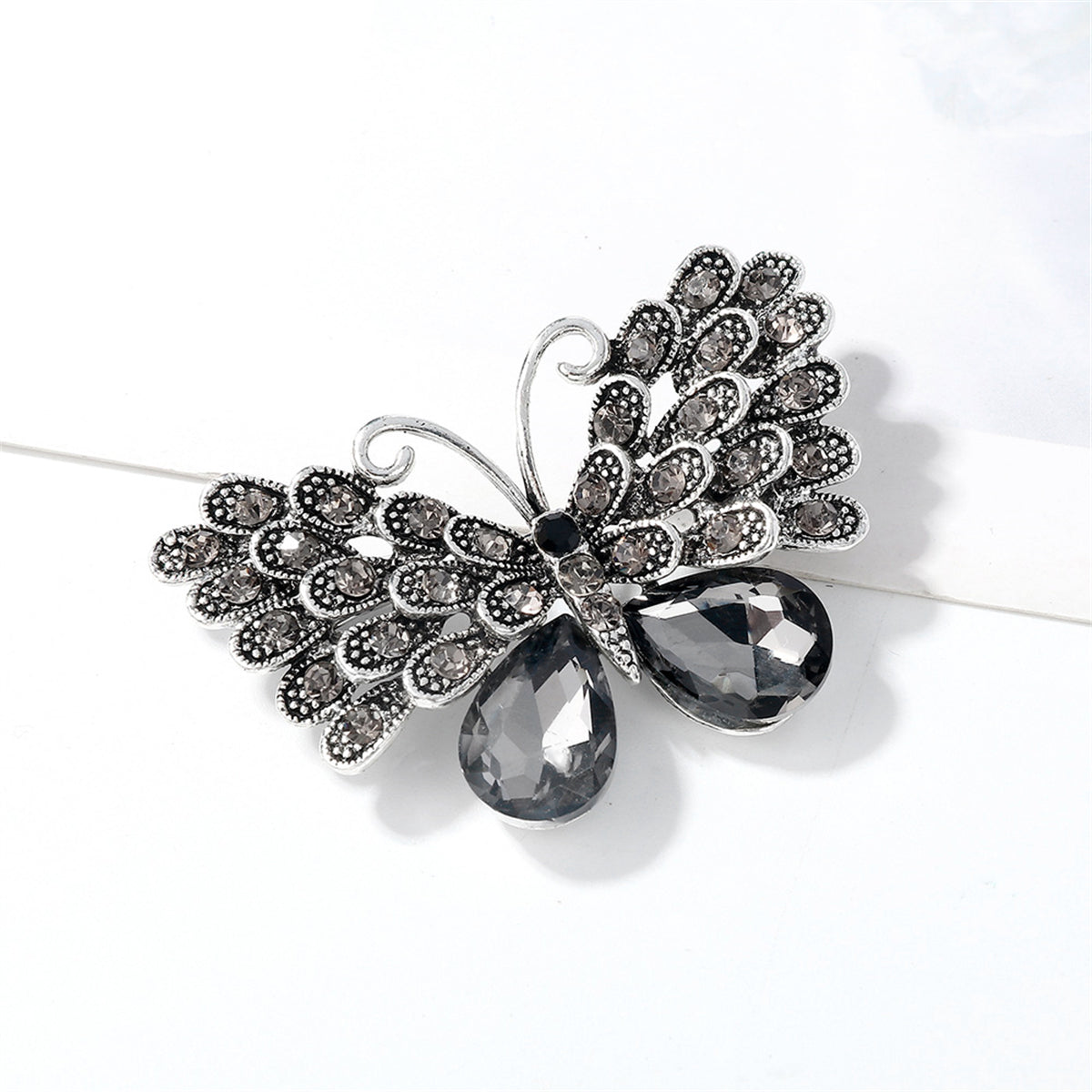 Gray Crystal and Cubic Zirconia Silver-Plated Butterfly Brooch, silver brooch pin, vintage-inspired design, lifestyle look