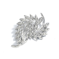 A stunning white pearl and diamond brooch featuring clear crystal and cubic zirconia in a botanical design.