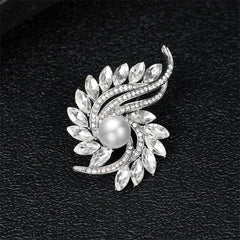 Exquisite white pearl and diamond brooch, embellished with clear crystals and cubic zirconia in a floral-inspired design.