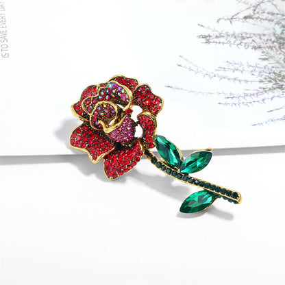 Red Cubic Zirconia and Crystal 18K Gold-Plated Rose Brooch, gold brooch pin, botanical inspired, detail close-up