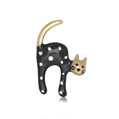 Black and white cat brooch crafted from black enamel with an elegant 18K gold-plated spot accent.