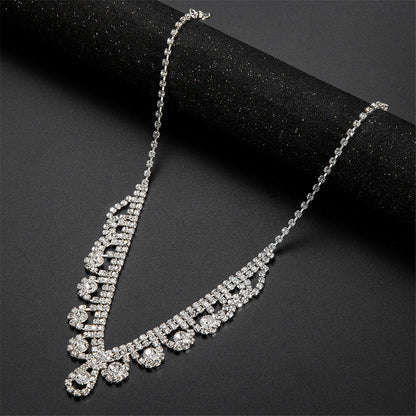Cubic Zirconia and Silver-Plated Tassel Necklace Set, silver drop earrings for women, botanical inspired, side view