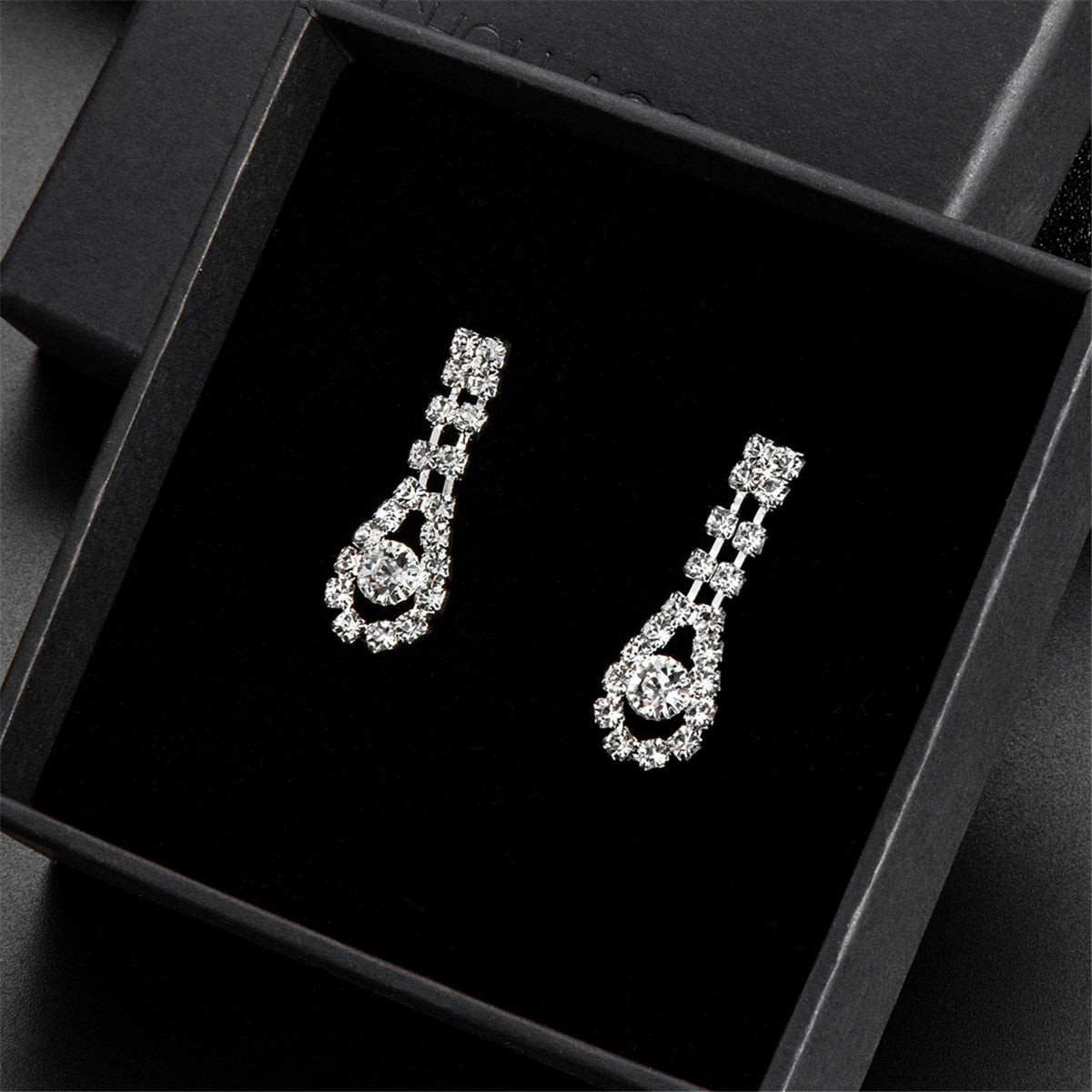 Cubic Zirconia and Silver-Plated Tassel Necklace Set, silver drop earrings for women, botanical inspired, detail close-up
