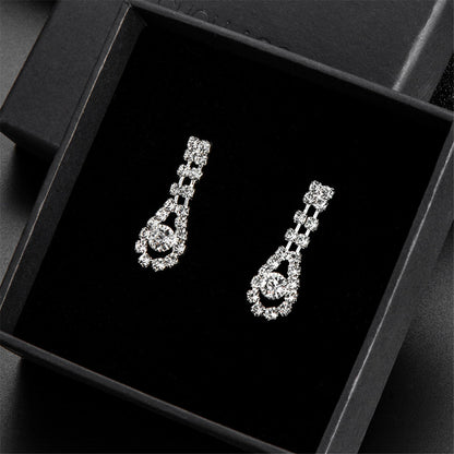 Cubic Zirconia and Silver-Plated Tassel Necklace Set, silver drop earrings for women, botanical inspired, detail close-up
