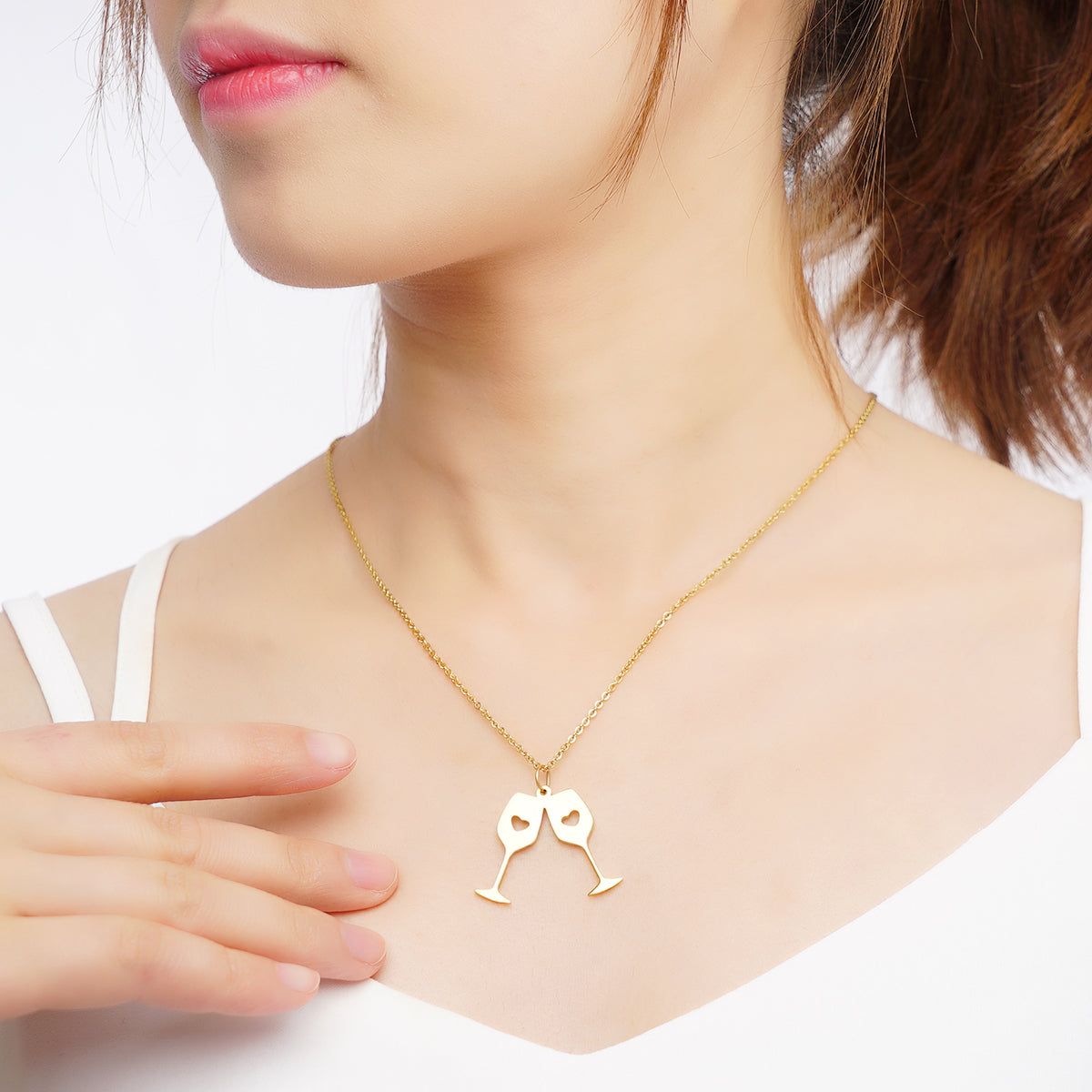 Exquisite 18K gold-plated necklace featuring a double wine cup pendant, a sophisticated touch for any wine-themed outfit.