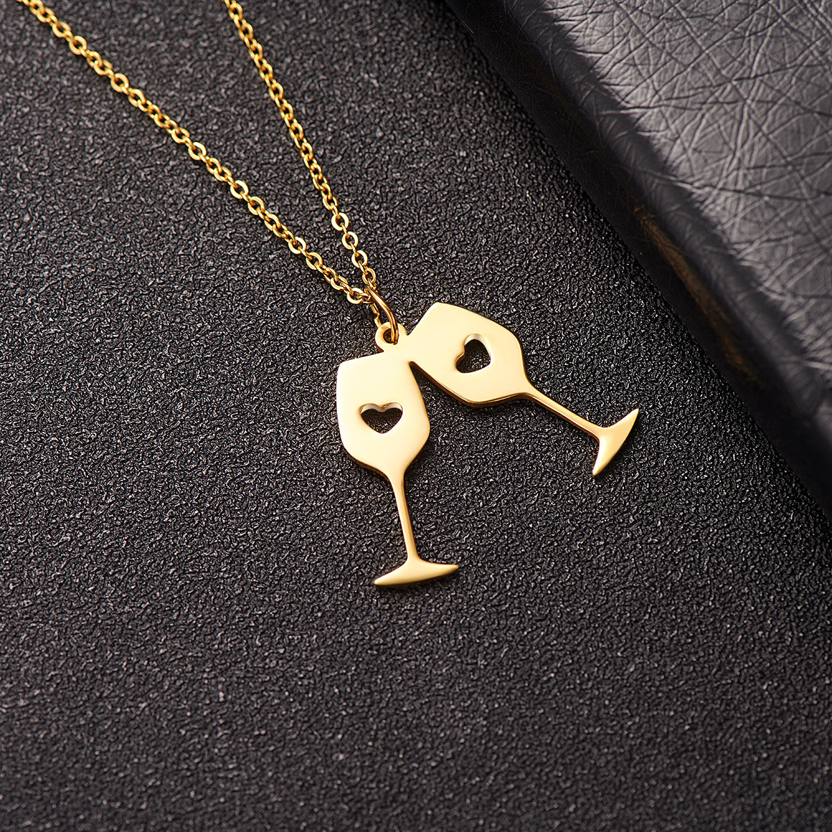 Stunning 18K gold-plated necklace adorned with a unique double wine glass pendant, ideal for celebrating life's moments.