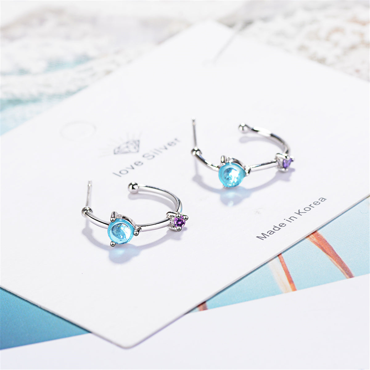 Blue Crystal and Cubic Zirconia Hoop Earrings, stud earrings for women, everyday style, front view