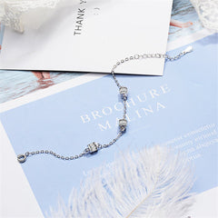 Cubic Zirconia & Silver-Plated Cage Charm Bracelet