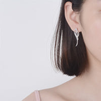 Cubic Zirconia & Silvertone Wing Dangle Earrings