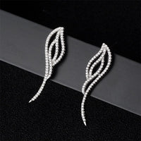 Cubic Zirconia & Silvertone Wing Dangle Earrings