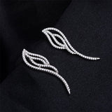 Cubic Zirconia & Silvertone Wing Dangle Earrings