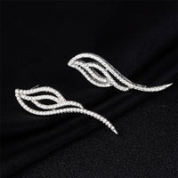 Cubic Zirconia & Silvertone Wing Dangle Earrings