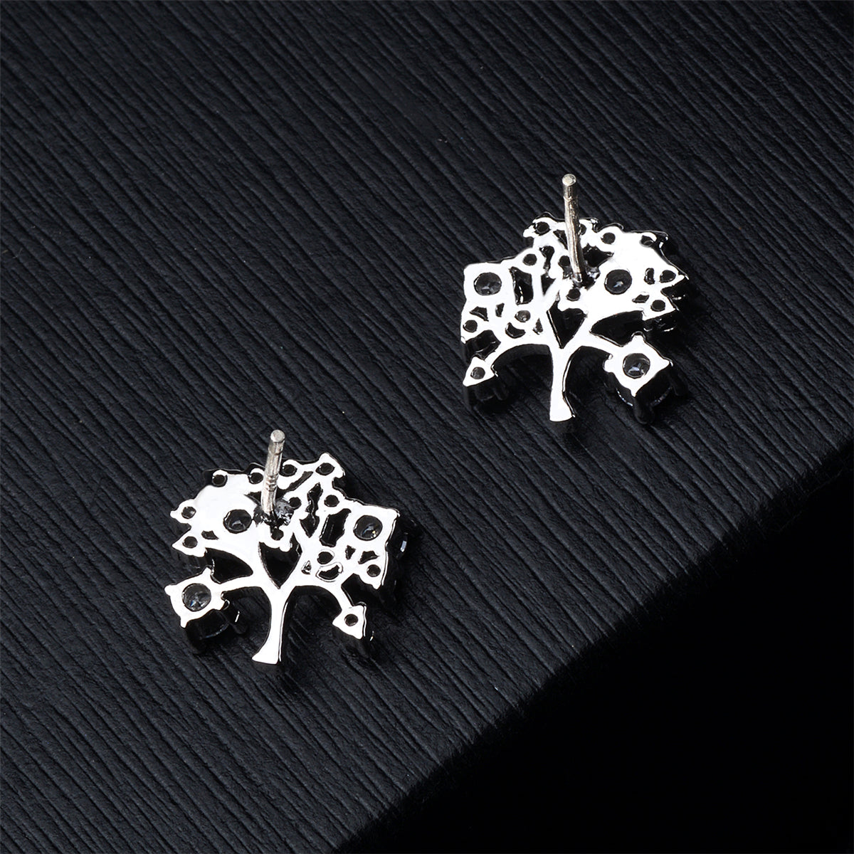 Cubic Zirconia and Silver-Plated Tree Stud Earrings, silver stud earrings for women, vintage-inspired design, detail close-up