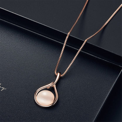 Rose Quartz and Cubic Zirconia Pendant Necklace and Drop Earrings, drop earrings for women, everyday style, detail close-up