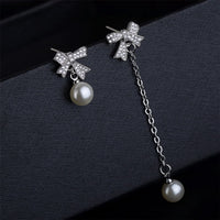 cubic zirconia & Imitation Pearl Bow Asymmetrical Drop Earrings - streetregion