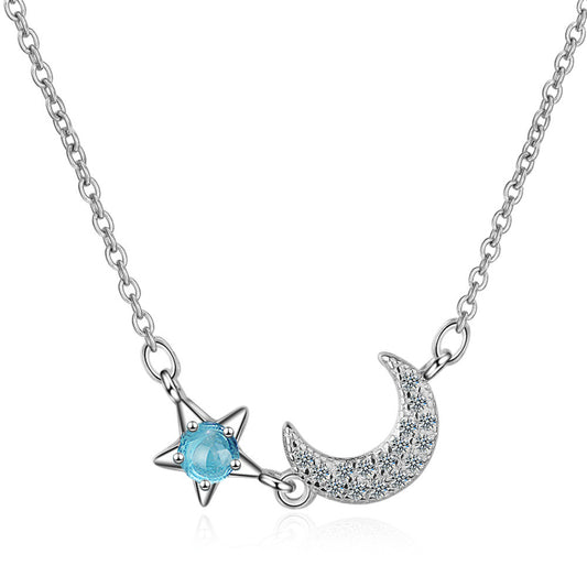 Blue Crystal and Cubic Zirconia Star and Moon Pendant Necklace, pendant necklace for women, botanical inspired, front view