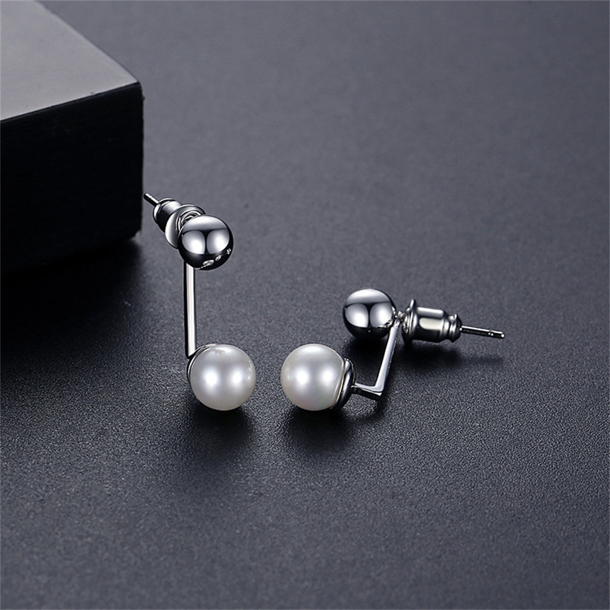 Pearl and Silver-Plated Bar Ear Jackets, silver drop earrings for women, botanical inspired, front view