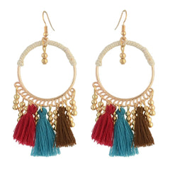 Stunning 18K gold-plated hoop earrings featuring colorful tassels, perfect for adding flair to any outfit.