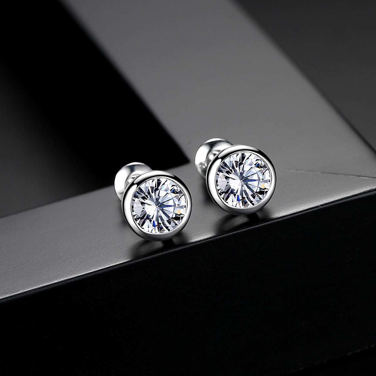 Cubic Zirconia and Silver-Plated Round Stud Earrings, silver stud earrings for women, vintage-inspired design, front view