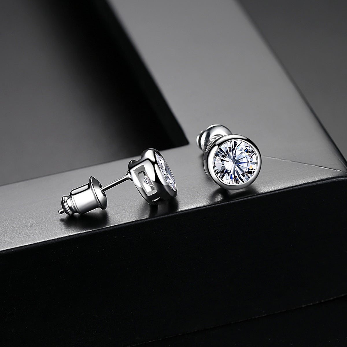 Cubic Zirconia and Silver-Plated Round Stud Earrings, silver stud earrings for women, vintage-inspired design, side view
