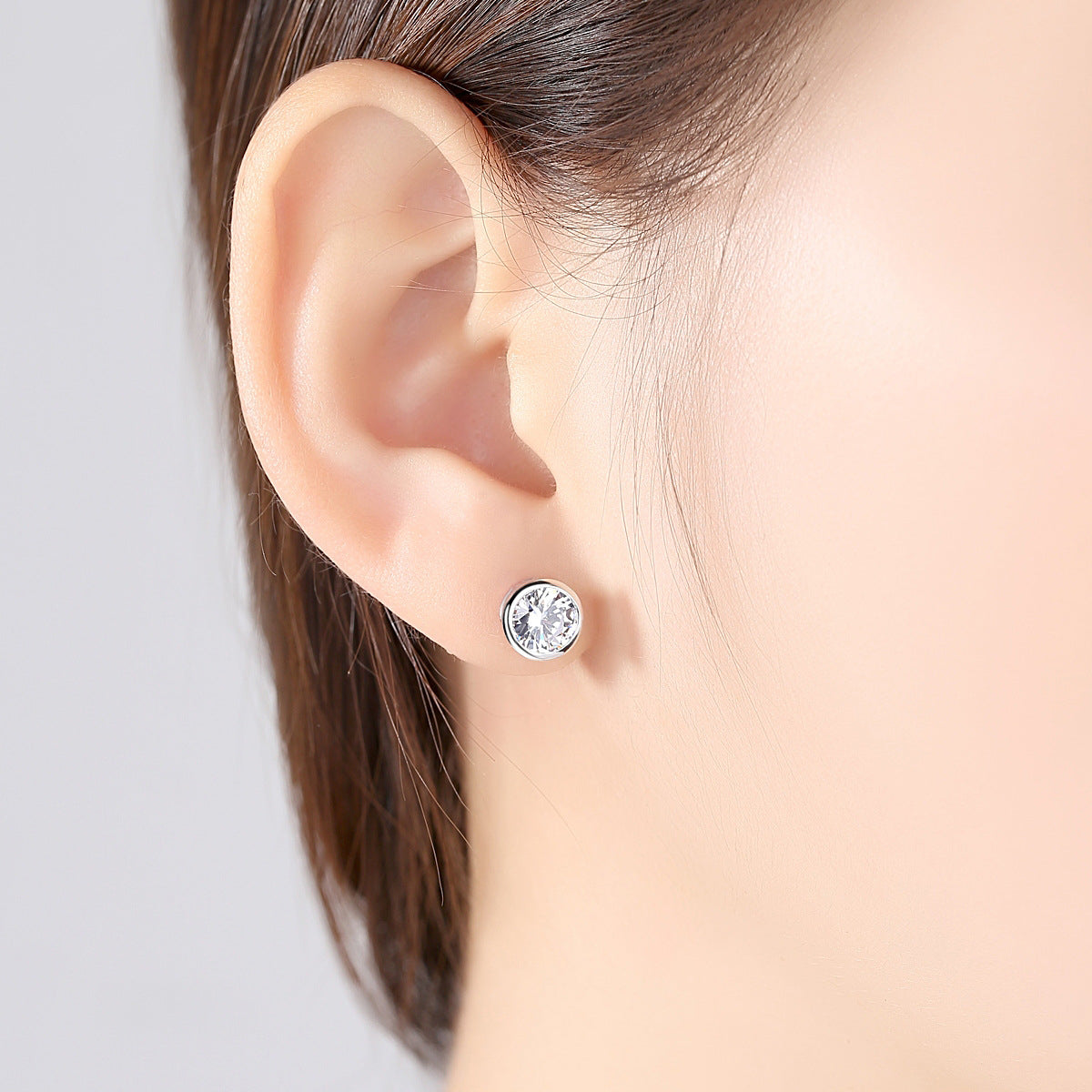 Cubic Zirconia and Silver-Plated Round Stud Earrings, silver stud earrings for women, vintage-inspired design, lifestyle look