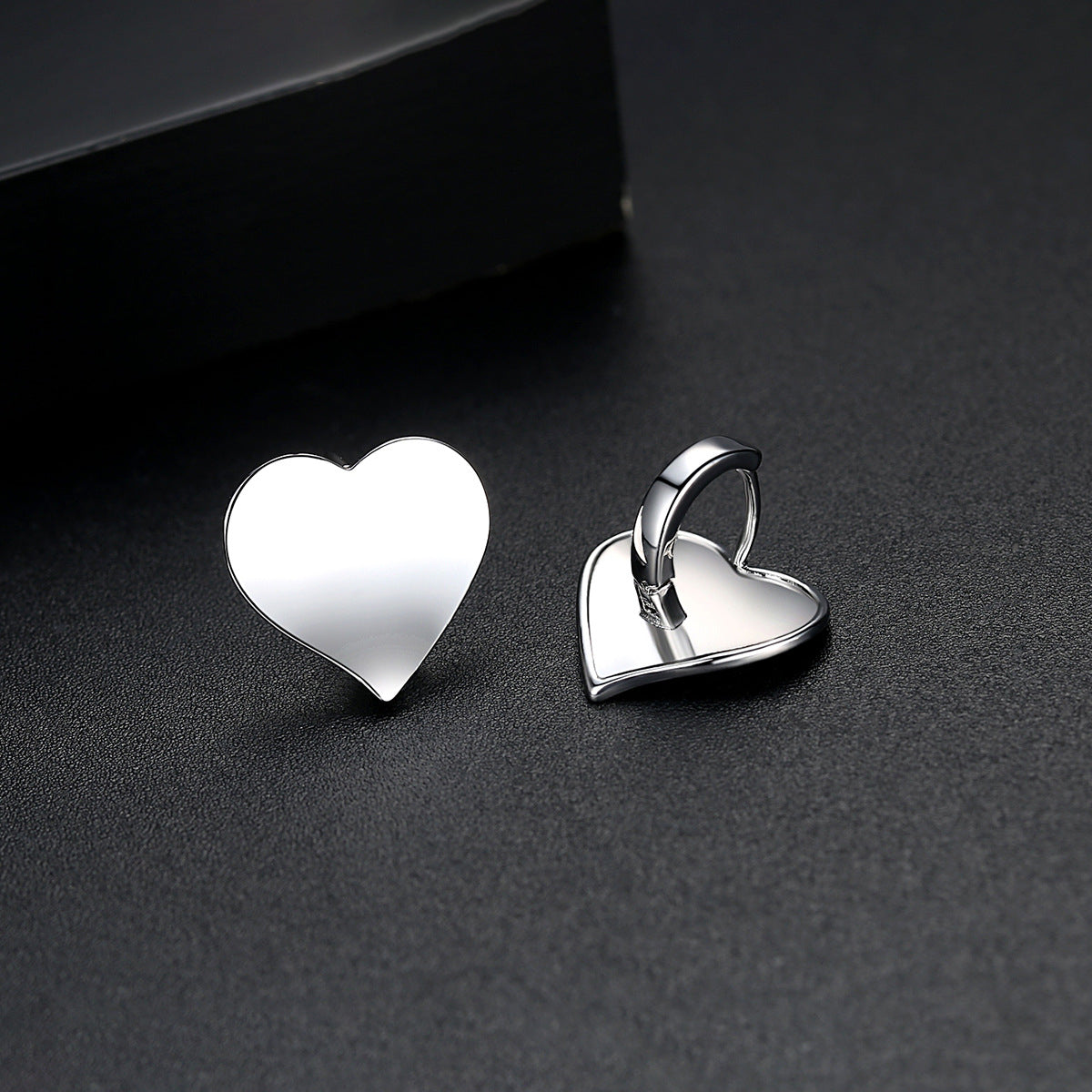 Silver-Plated Heart Huggie Earrings, silver huggie earrings, everyday style, side view