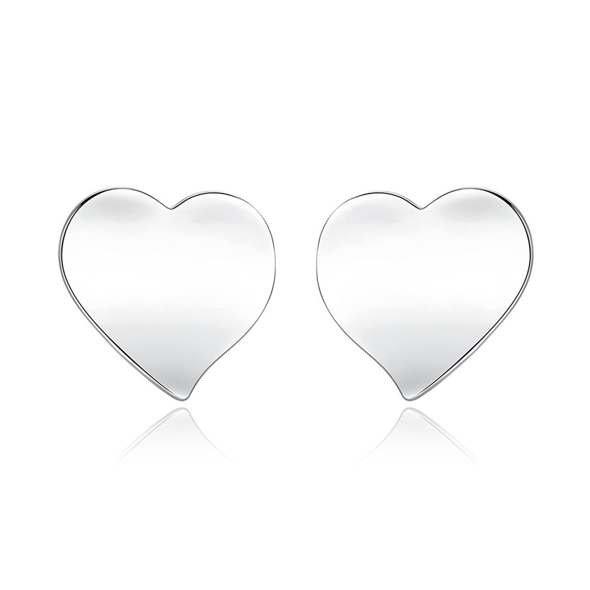 Silver-Plated Heart Huggie Earrings, silver huggie earrings, everyday style, detail close-up