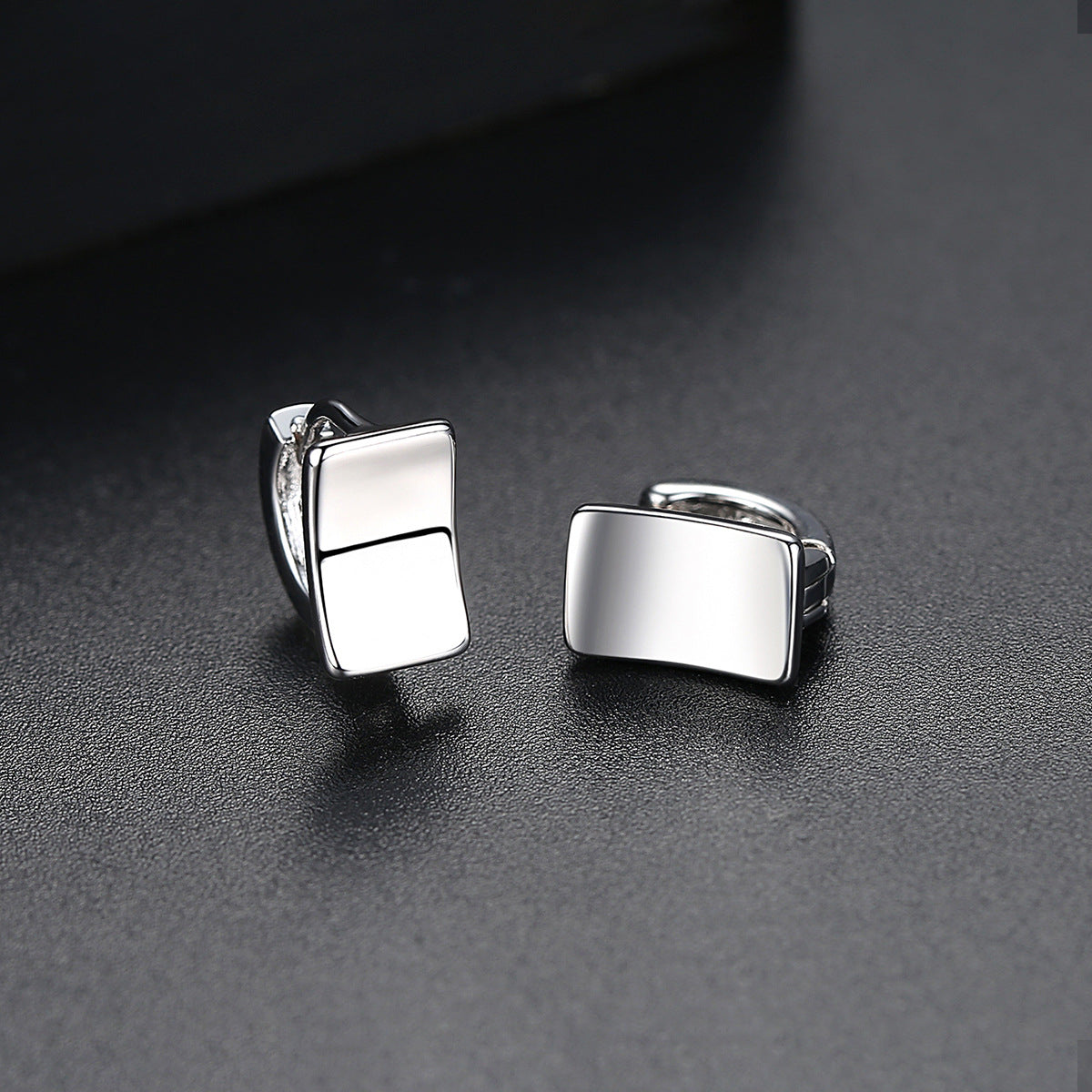 Silver-Plated Curved Rectangle Face Huggie Earrings, silver huggie earrings, botanical inspired, side view
