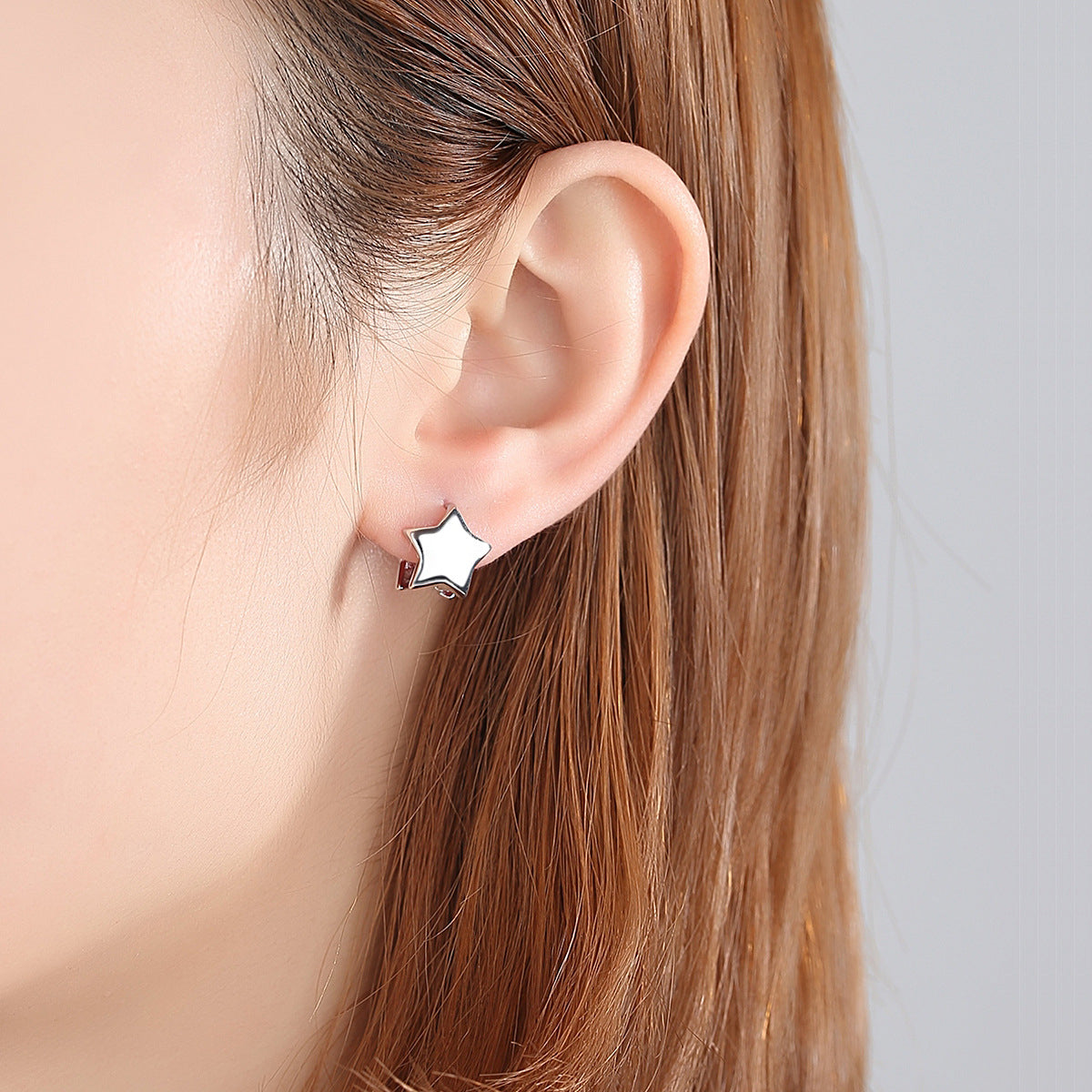 Silver-Plated Star Huggie Earrings, silver huggie earrings, botanical inspired, detail close-up