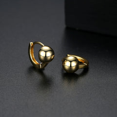 Elegant 18K gold-plated ball huggie earrings, showcasing a stunning gold tone for a chic and sophisticated look.