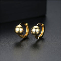 Stylish 18K gold-plated ball earrings, perfect for adding a touch of elegance to any outfit with their radiant gold tone.