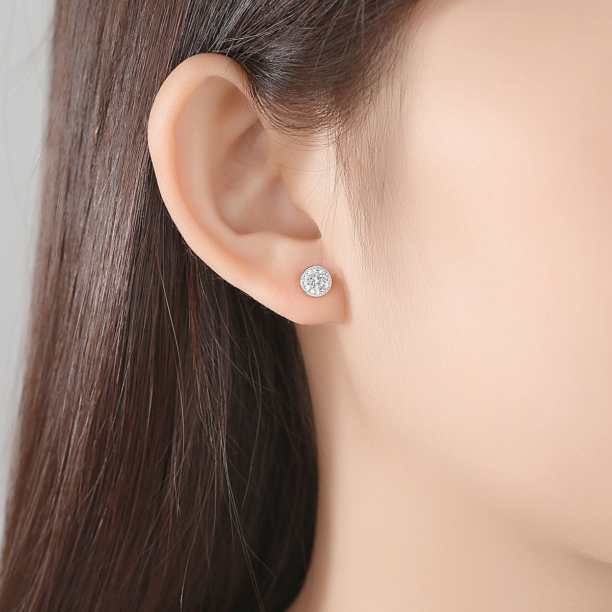 Cubic Zirconia and Silver-Plated Round Stud Earrings, silver stud earrings for women, everyday style, detail close-up