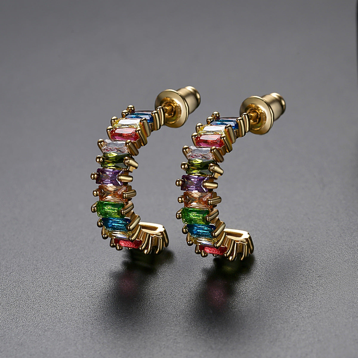 Green Crystal and 18K Gold-Plated Open Huggie Earrings, gold huggie earrings, dainty minimalist design, detail close-up