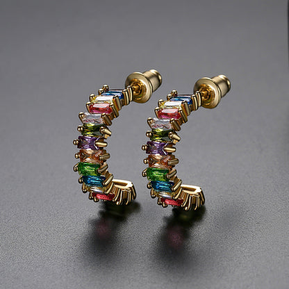 Green Crystal and 18K Gold-Plated Open Huggie Earrings, gold huggie earrings, dainty minimalist design, detail close-up