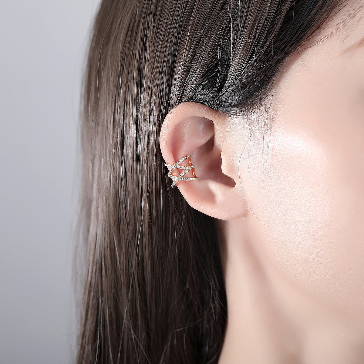 Cubic Zirconia and 18K Gold-Plated Crisscross Ear Cuff, gold stud earrings for women, everyday style, detail close-up