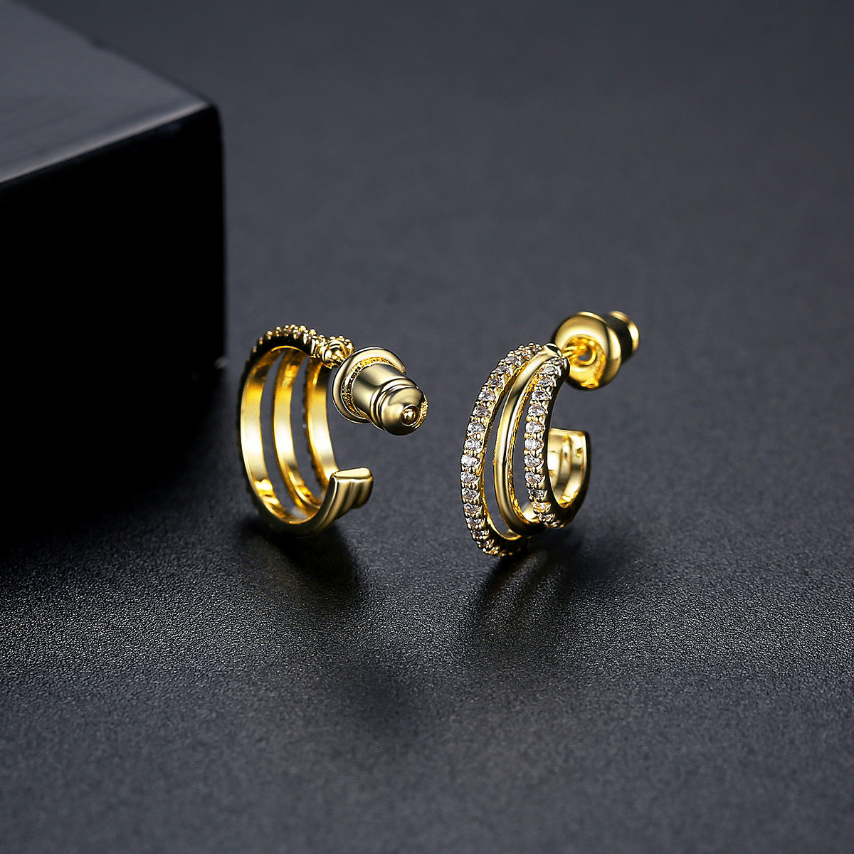 Cubic Zirconia and 18K Gold-Plated Layered Huggie Earrings, gold huggie earrings, everyday style, detail close-up