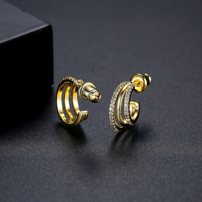 Cubic Zirconia and 18K Gold-Plated Layered Huggie Earrings, gold huggie earrings, everyday style, detail close-up