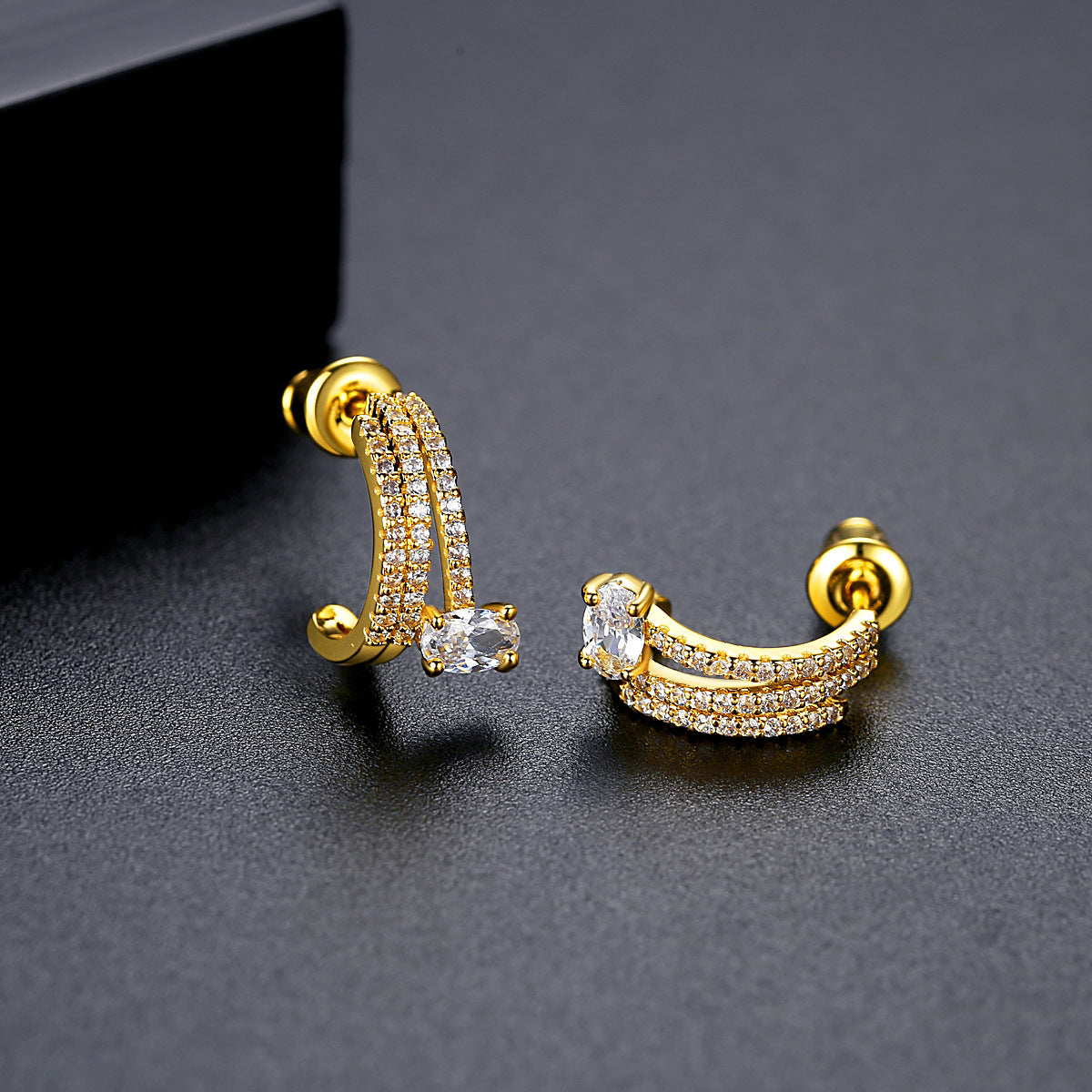 Crystal and 18K Gold-Plated Cubic Zirconia-Accent Layered Huggie Earrings, gold huggie earrings, detail close-up