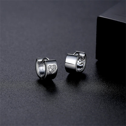 Cubic Zirconia and Silver-Plated Hearts Huggie Earrings, silver huggie earrings, dainty minimalist design, front view