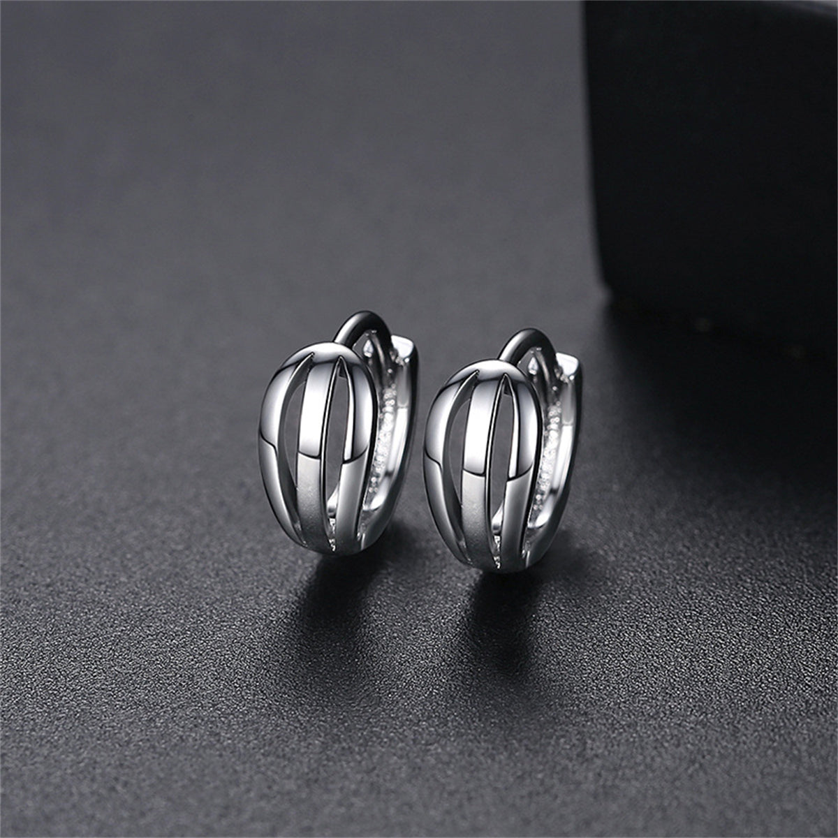 Silver-Plated Salix Leaf Huggie Earrings, silver huggie earrings, everyday style, front view