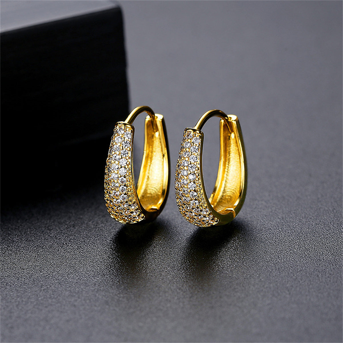 Cubic Zirconia and 18K Gold-Plated U-Shape Huggie Earrings, gold huggie earrings, dainty minimalist design, side view