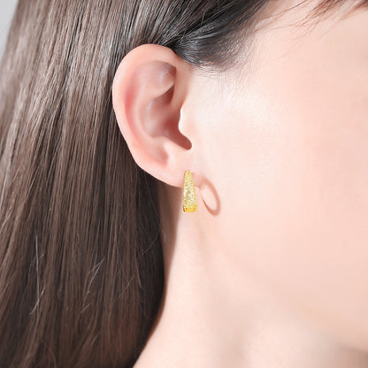 Cubic Zirconia and 18K Gold-Plated U-Shape Huggie Earrings, gold huggie earrings, dainty minimalist design, detail close-up