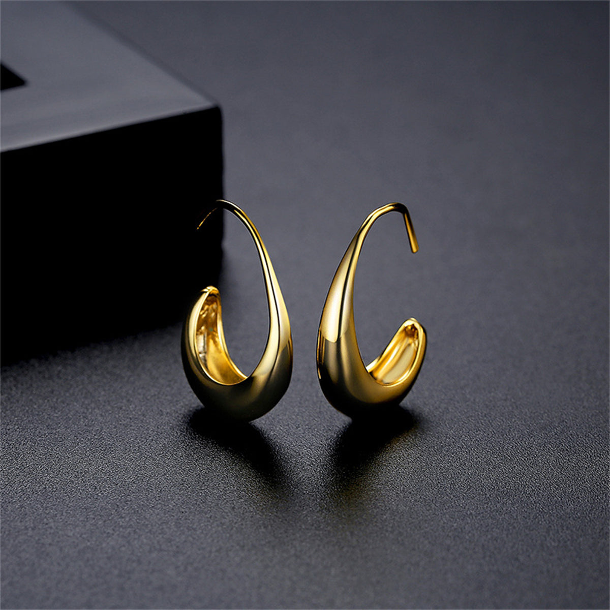 18K Gold-Plated Smooth Face Huggie Earrings, gold huggie earrings, dainty minimalist design, side view