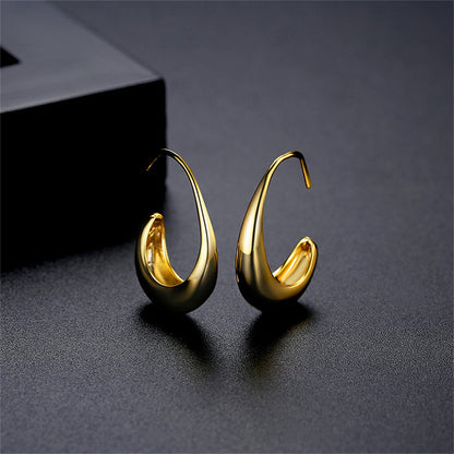 18K Gold-Plated Smooth Face Huggie Earrings, gold huggie earrings, dainty minimalist design, side view