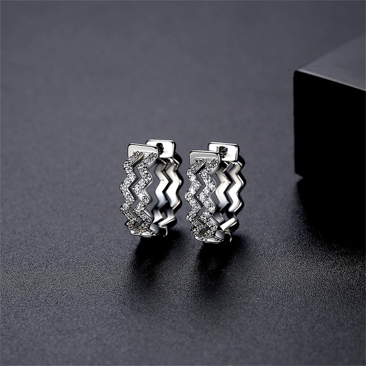 Cubic Zirconia and Silver-Plated Layered Wave Huggie Earrings, silver huggie earrings, elegant gift for her, front view